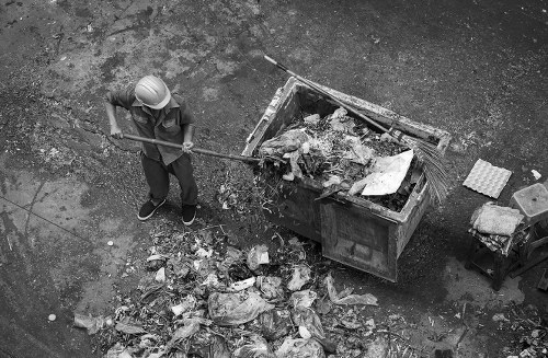 People disposing of old furniture in Hackbridge
