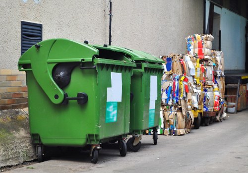 Workers managing builders waste in Hackbridge